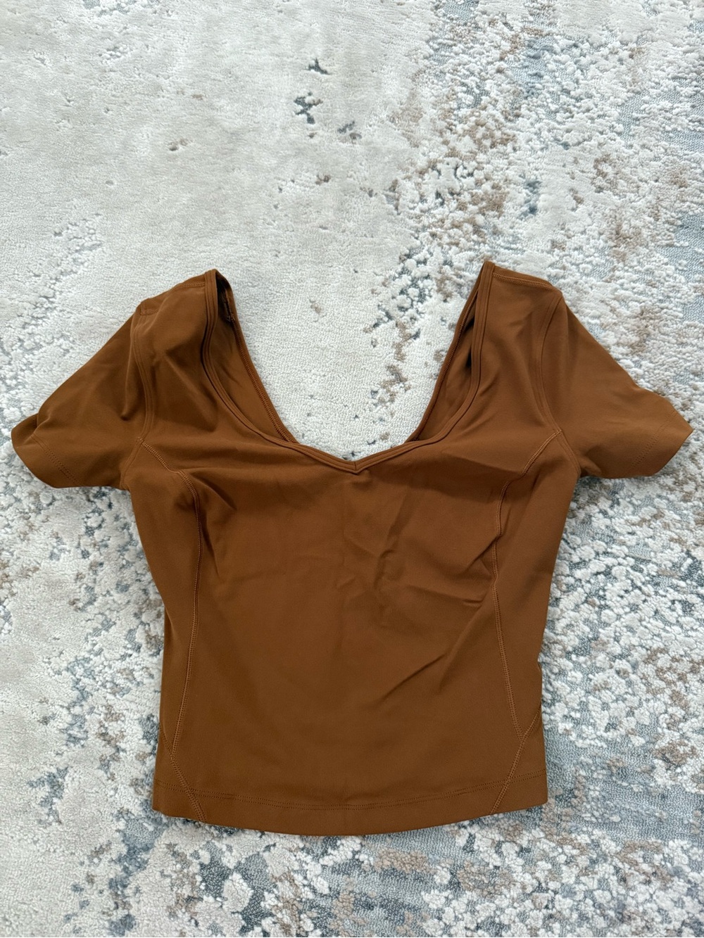 orange/brown lululemon top! Never worn.